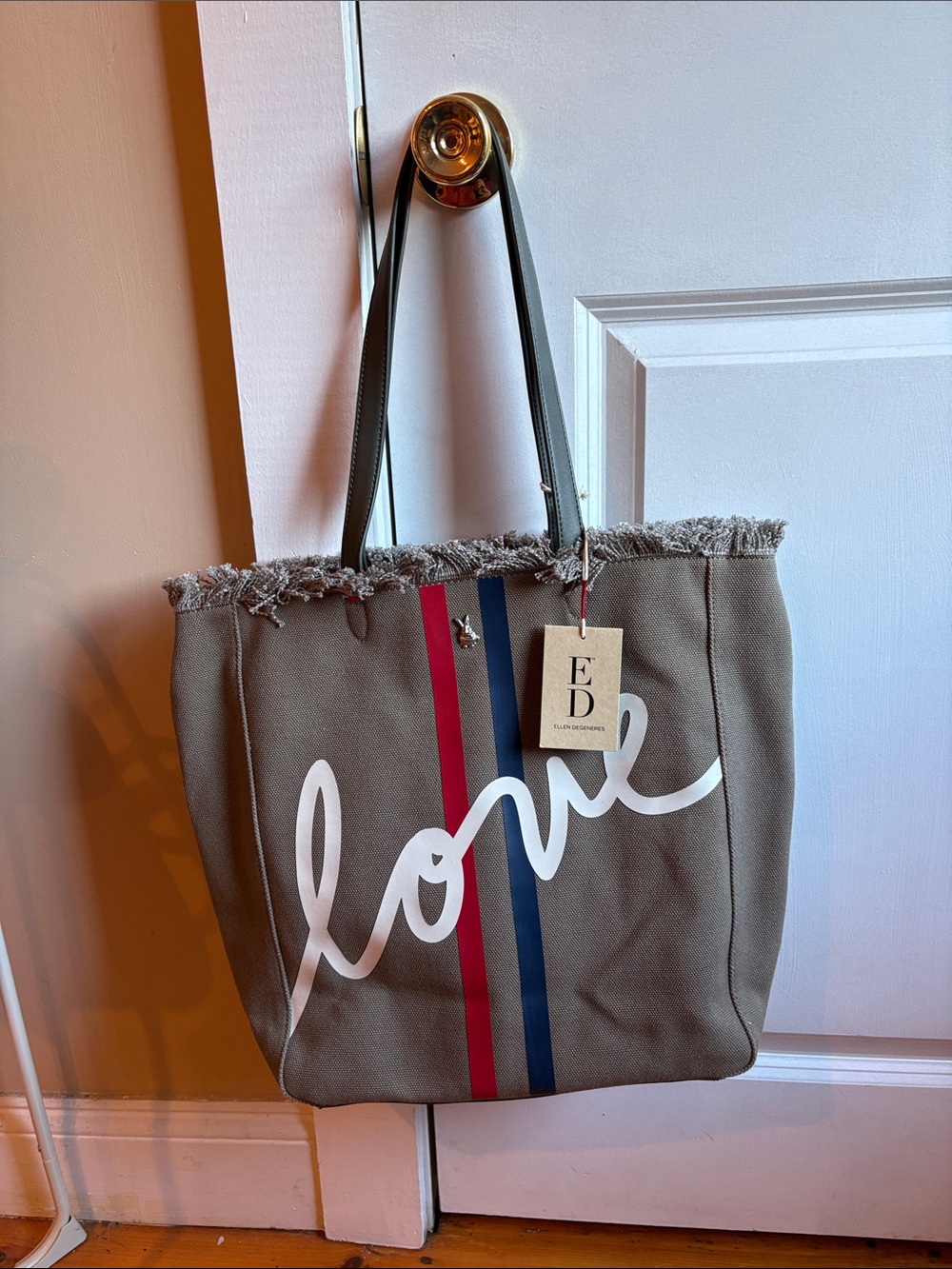 Ellen Degeneres Taupe Fringe 'Love' Tote with Red & Blue Stripes